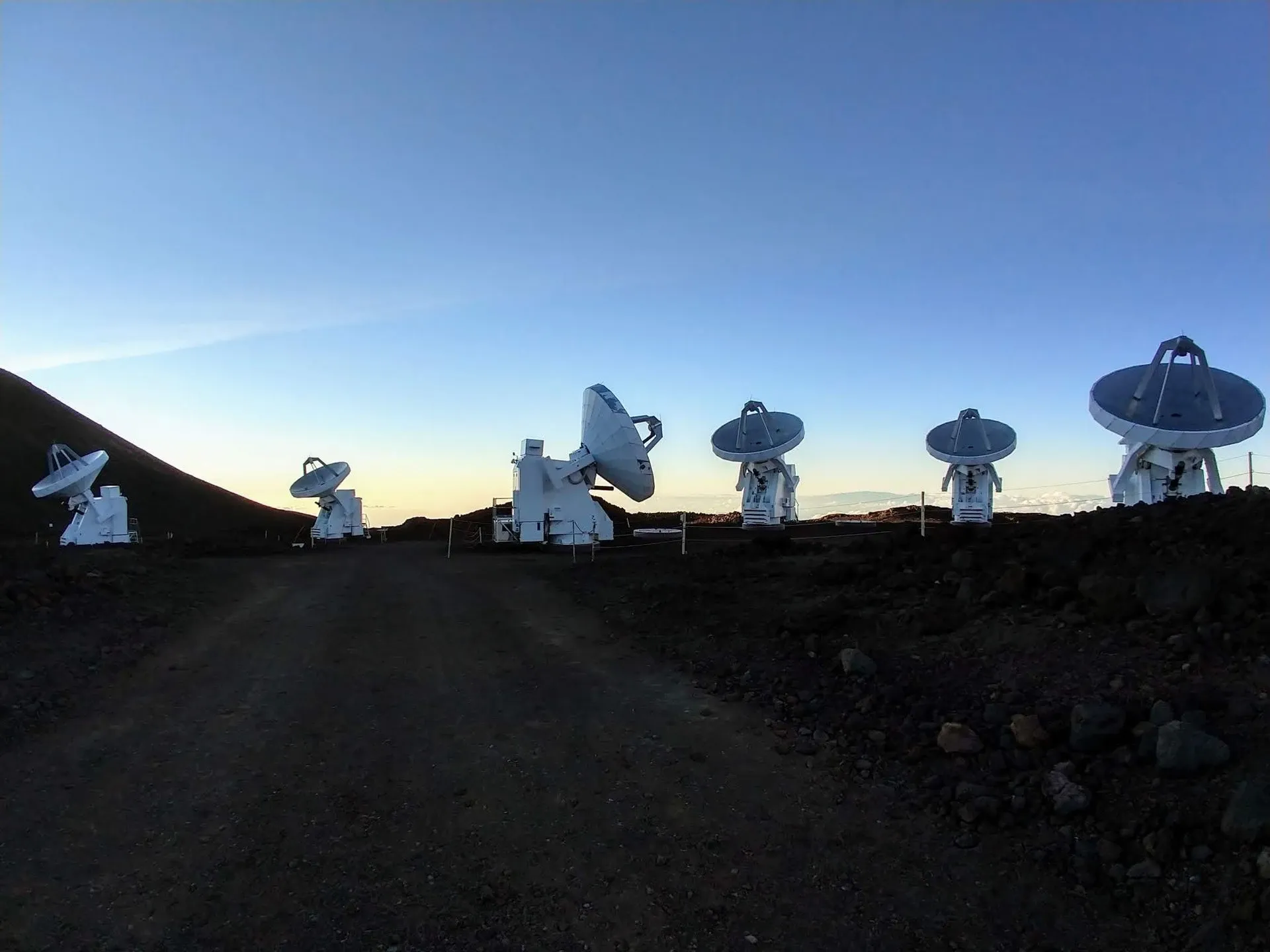 Six Submillimeter Array antennas on Maunakea at dusk